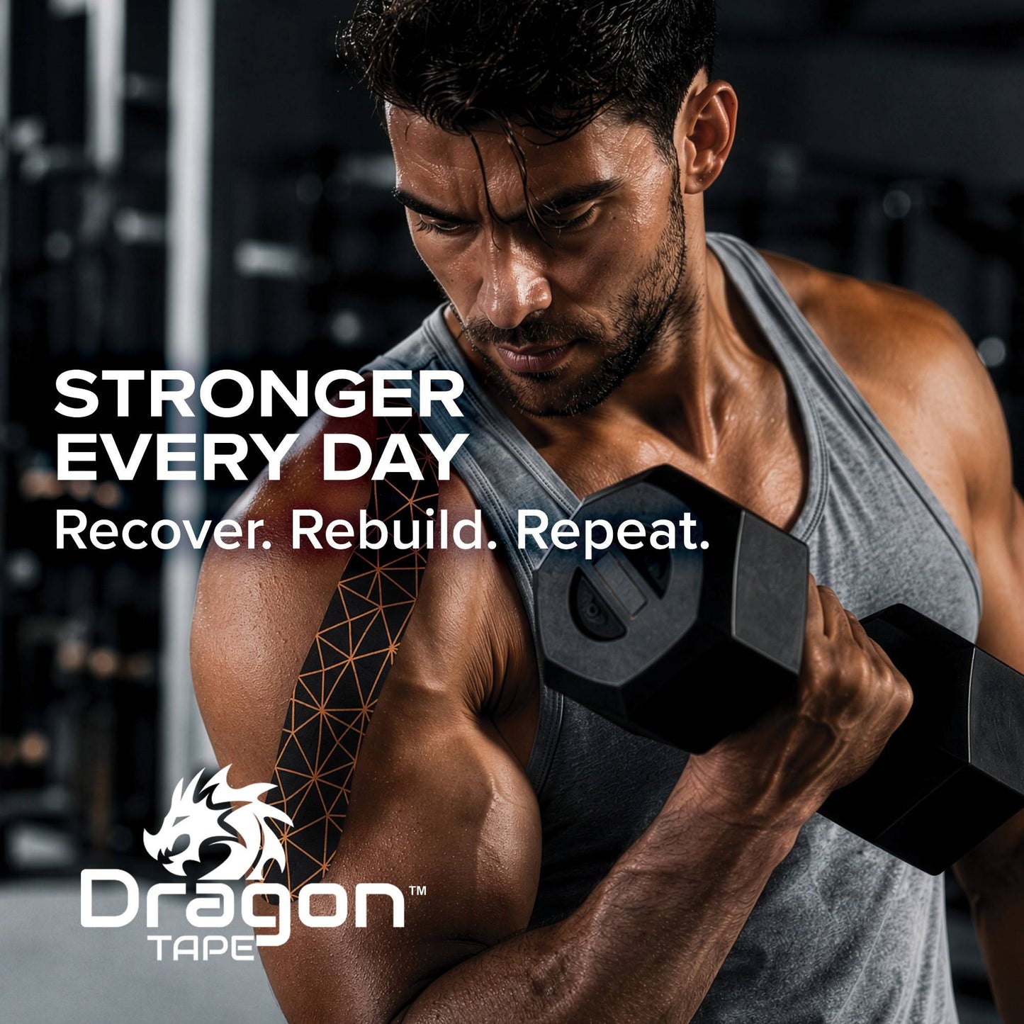 Male athlete lifting weights with Dragon Tape copper infused kinesiology tape on shoulder for workout support.