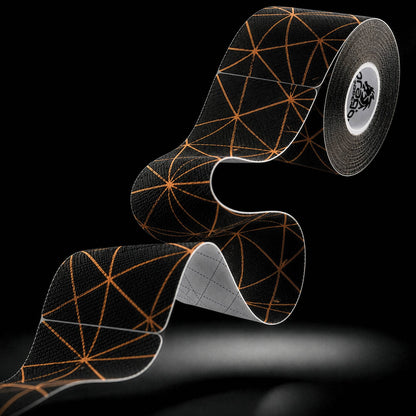 Dragon Tape copper-infused black kinesiology tape roll and strip with geometric pattern.