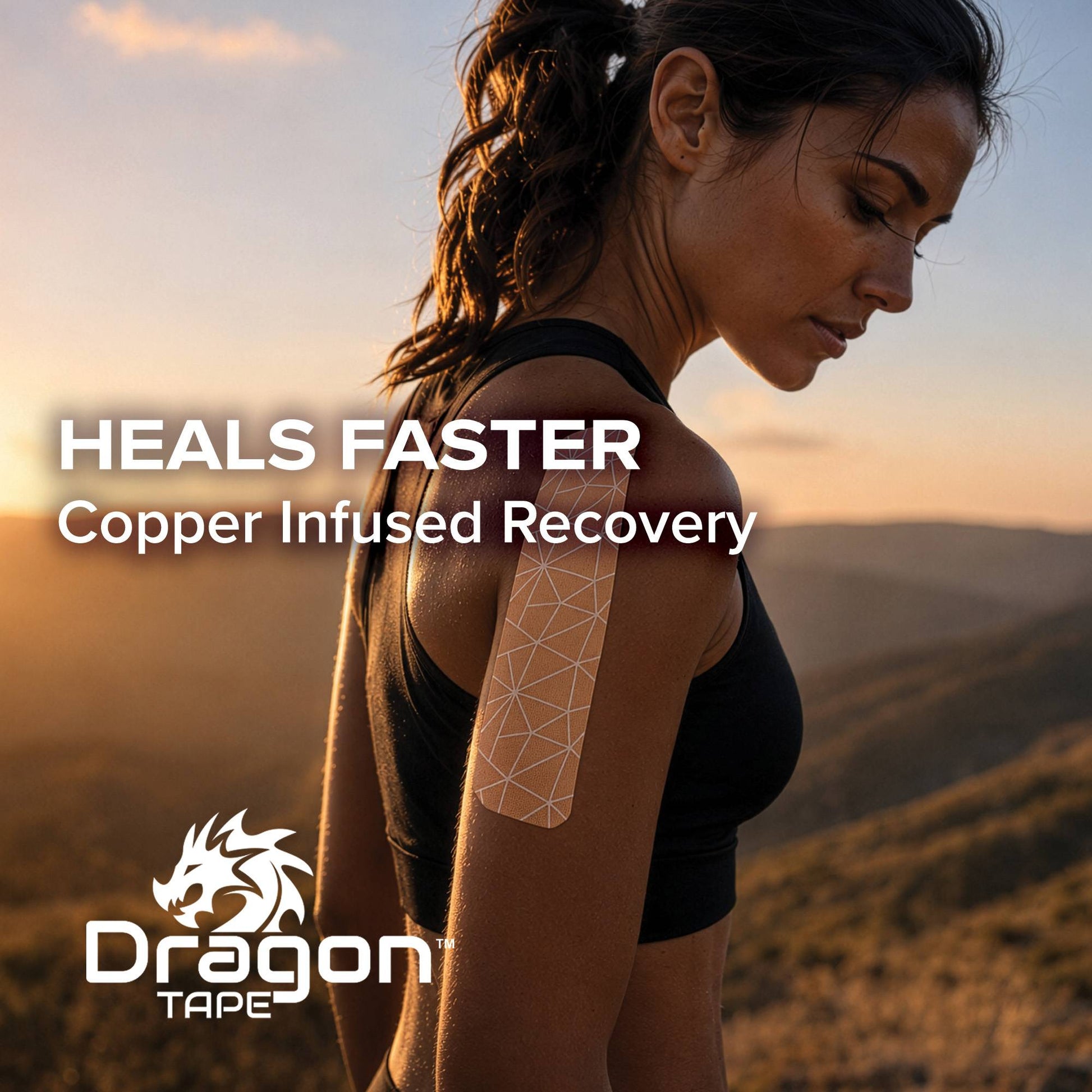 Woman athlete wearing Dragon Tape copper infused kinesiology tape on shoulder during outdoor recovery training.